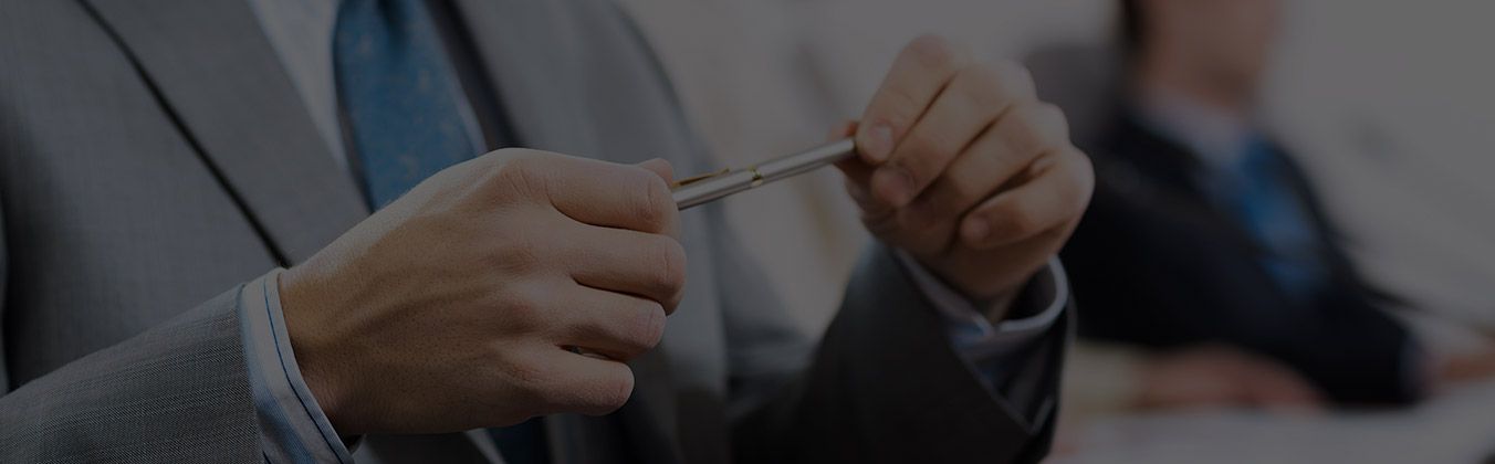 Lawyer holding a pen