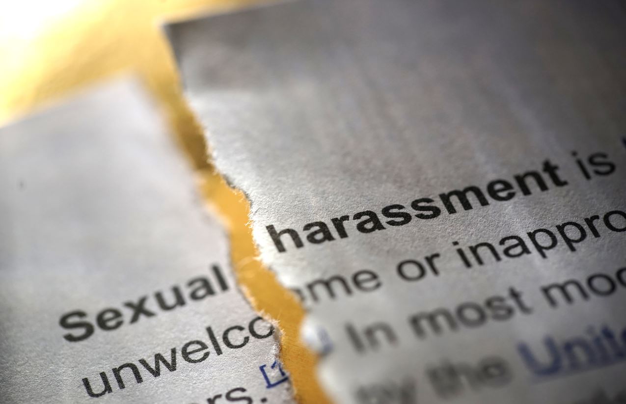 shot of word sexual harrassment